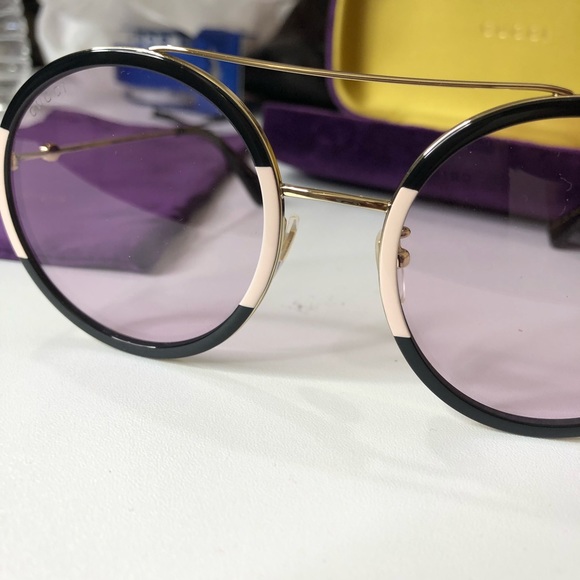 gucci round frame metal glasses